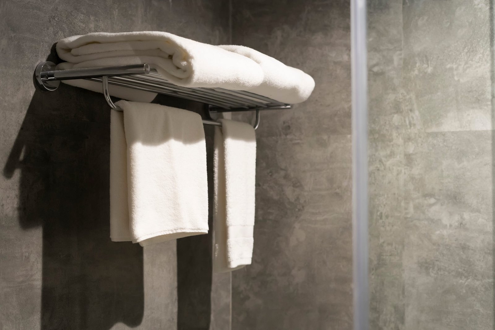 Folded towels on a heated rail
