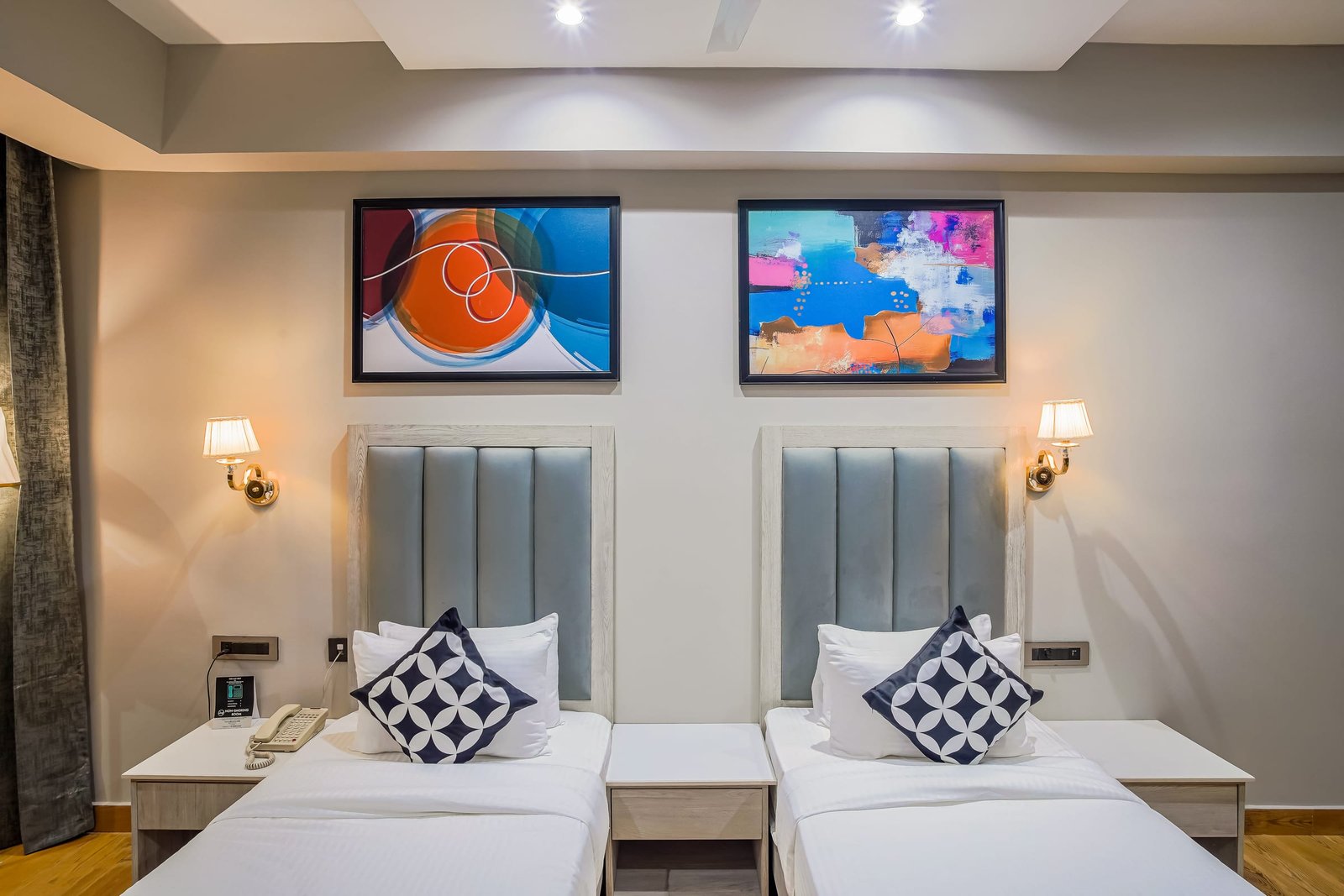 Double room with framed art above the bed