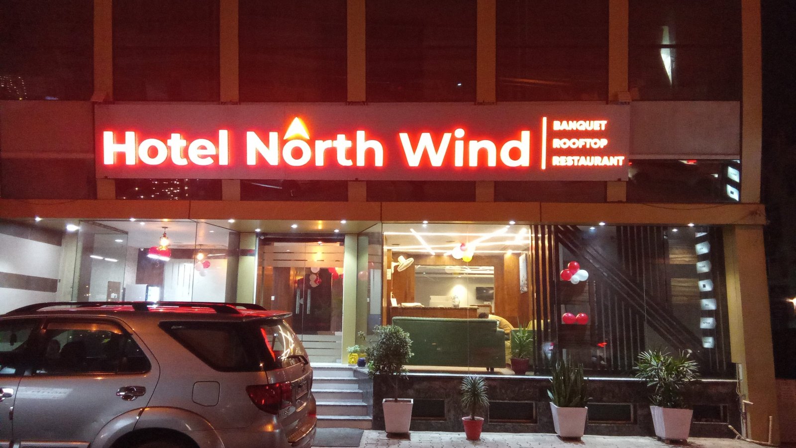 The entrance sign: banquet, rooftop, restaurant